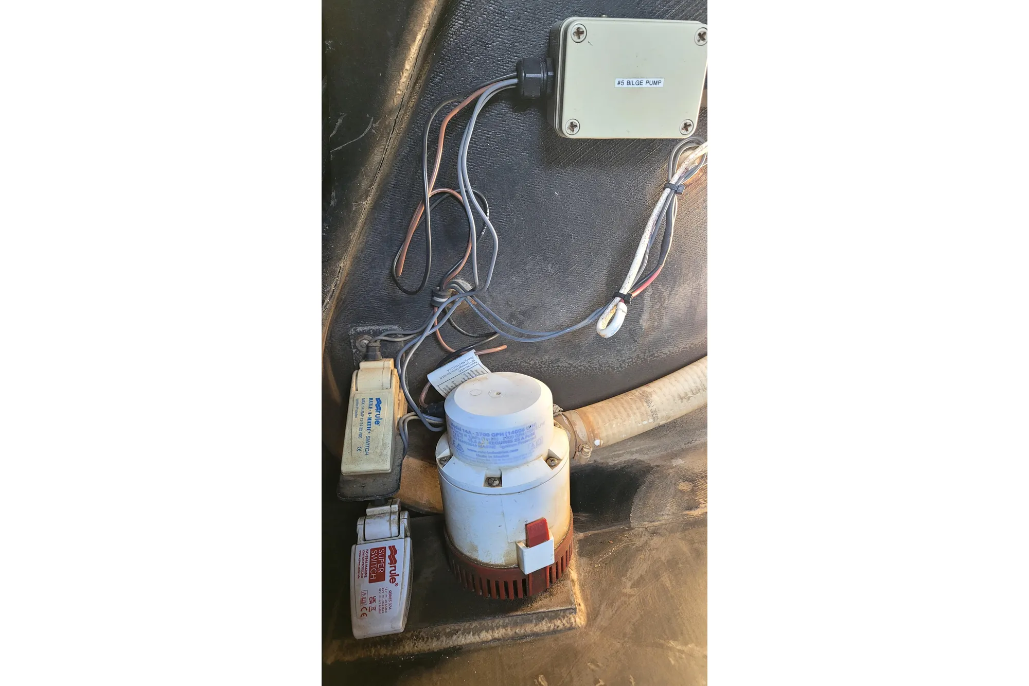 Bilge pump system in a 2002 Custom International Americas Cup Class boat.