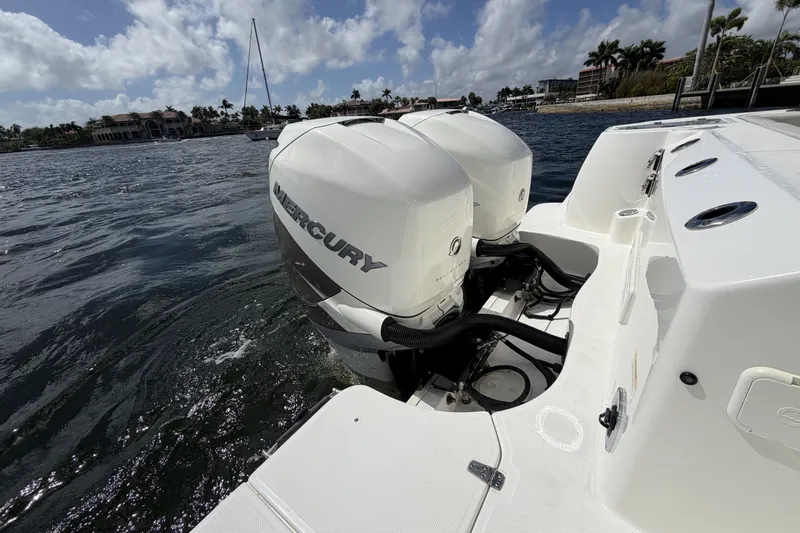  Yacht Photos Pics 2019 Boston Whaler 315 Conquest with Mercury engines on the water.