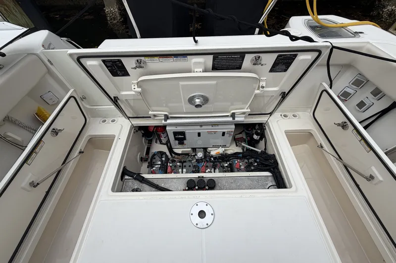  Yacht Photos Pics Engine compartment of 2019 Boston Whaler 315 Conquest with Kohler generator.