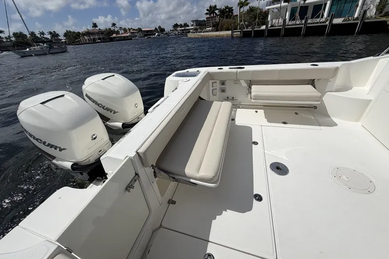  Yacht Photos Pics 2019 Boston Whaler 315 Conquest with twin engines on calm waters.