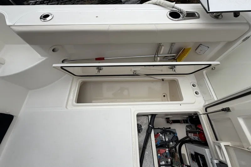  Yacht Photos Pics Boston Whaler 315 Conquest 2019, open storage and battery compartment.