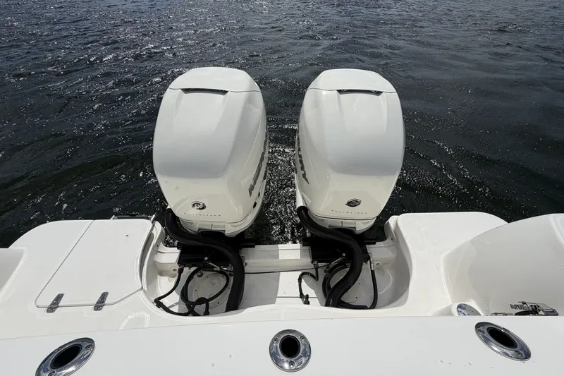  Yacht Photos Pics Twin outboard engines on a 2019 Boston Whaler 315 Conquest boat.