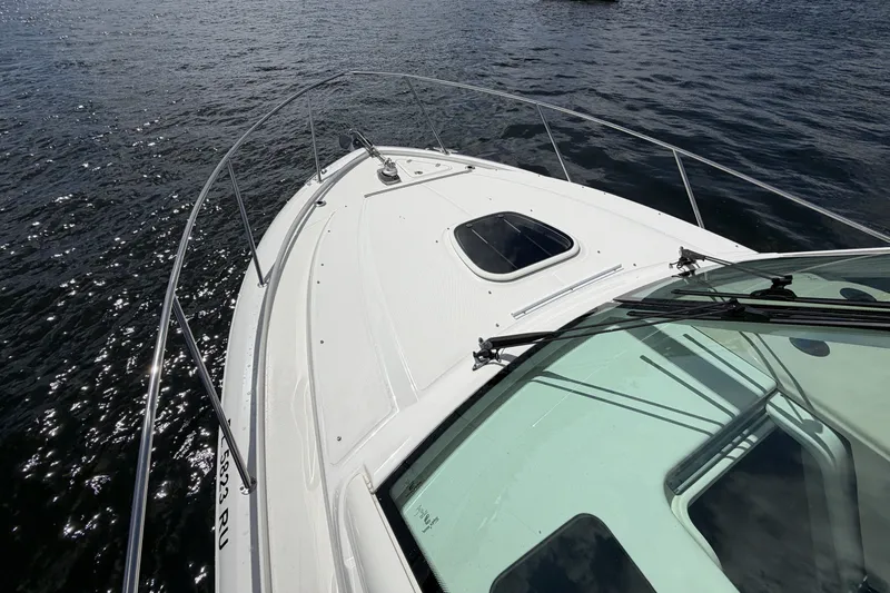  Yacht Photos Pics 2019 Boston Whaler 315 Conquest on calm waters.