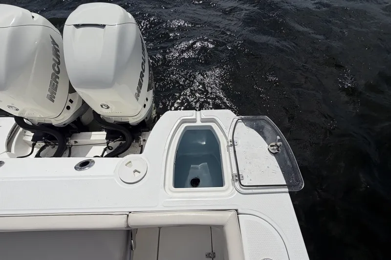  Yacht Photos Pics 2019 Boston Whaler 315 Conquest with Mercury engines on the water.