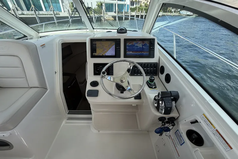  Yacht Photos Pics Interior view of 2019 Boston Whaler 315 Conquest cockpit.