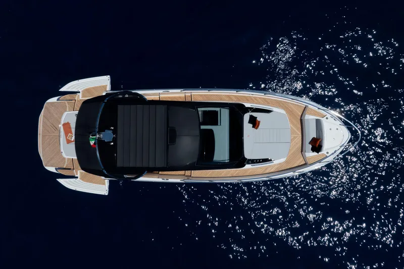  Yacht Photos Pics Aerial view of 2026 FIM 440 Regina yacht on sparkling blue water.