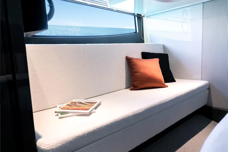  Yacht Photos Pics Modern interior of 2026 FIM 440 Regina yacht with cozy seating and ocean view.