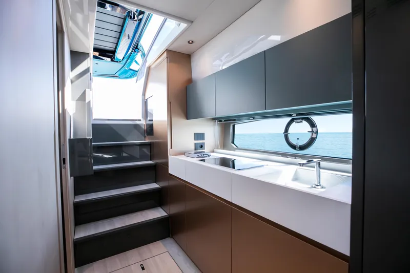  Yacht Photos Pics Modern kitchen interior on 2026 FIM 440 Regina yacht with ocean view.