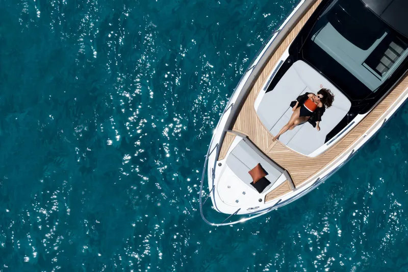  Yacht Photos Pics Aerial view of 2026 FIM 440 Regina yacht on clear blue water.