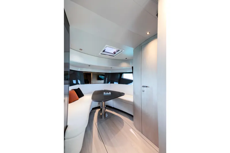  Yacht Photos Pics Luxurious interior of 2026 FIM 440 Regina yacht with modern seating and table.