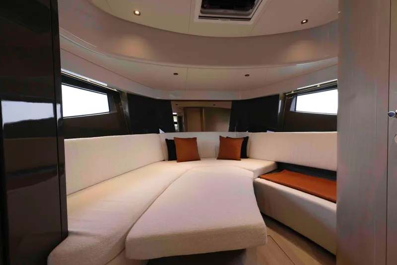  Yacht Photos Pics Luxurious interior of 2026 FIM 440 Regina yacht with elegant seating and cushions.