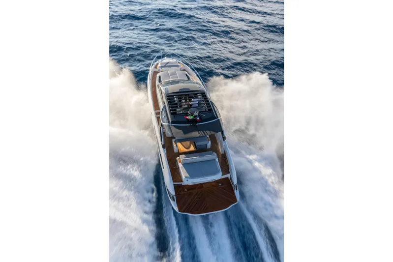  Yacht Photos Pics 2026 FIM 440 Regina yacht cruising on open water, aerial view.