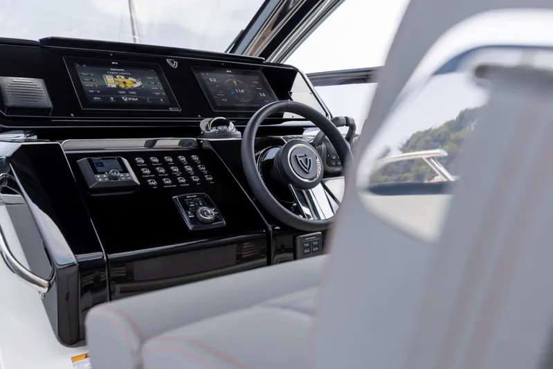  Yacht Photos Pics 2026 FIM 440 Regina yacht helm with advanced navigation displays and controls.