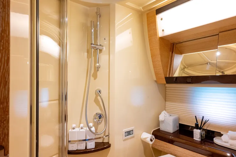 Golden Sun Yacht Photos Pics Luxurious bathroom interior of 2011 Azimut 58 yacht with modern shower and vanity.