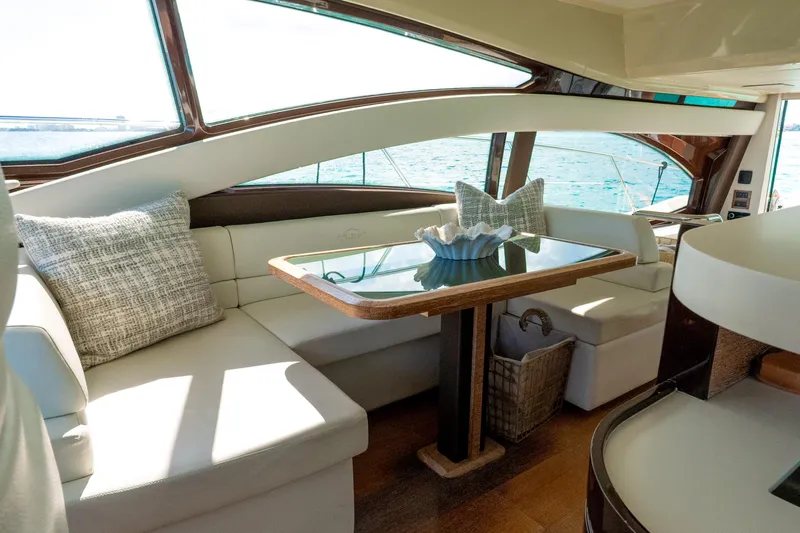 Golden Sun Yacht Photos Pics Luxurious interior of 2011 Azimut 58 yacht with elegant seating and ocean view.