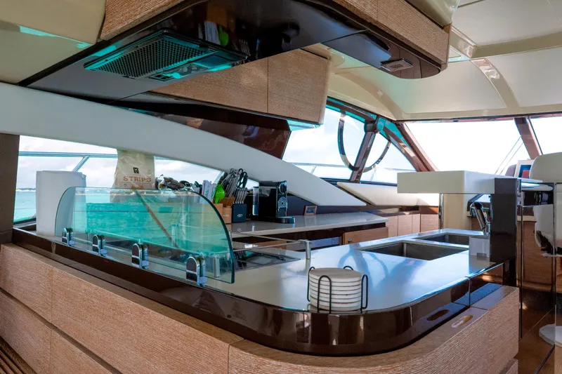 Golden Sun Yacht Photos Pics Luxurious interior of 2011 Azimut 58 yacht featuring modern kitchen design.