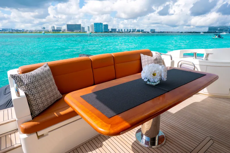 Golden Sun Yacht Photos Pics Luxurious Azimut 58 yacht deck with elegant seating and ocean view, 2011 model.