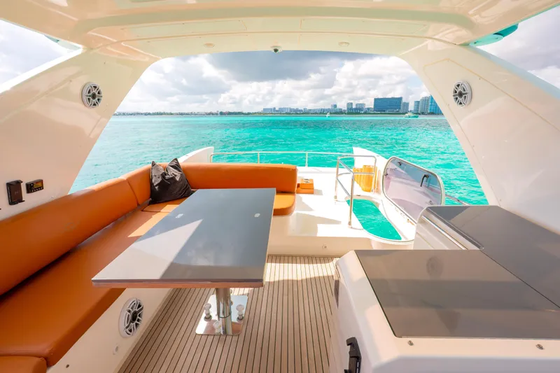 Golden Sun Yacht Photos Pics Luxurious 2011 Azimut 58 yacht interior with ocean view and modern seating area.