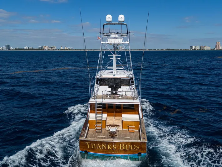 Thanks Buds Yacht Photos Pics 1985 Feadship Yacht Fisherman cruising on open water, rear view.