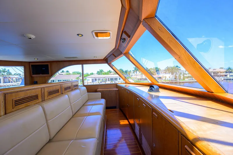 Thanks Buds Yacht Photos Pics Luxurious interior of a 1985 Feadship Yacht Fisherman with panoramic windows and leather seating.