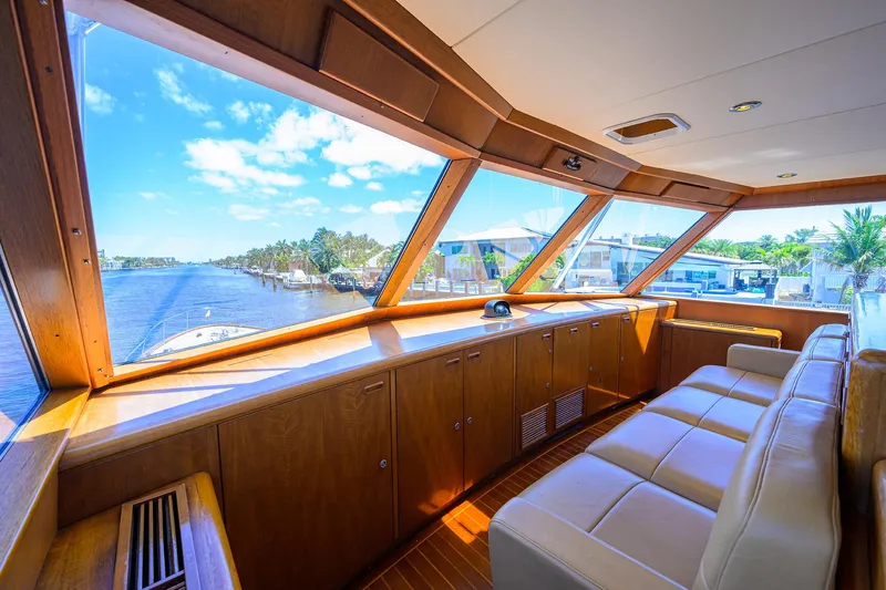 Thanks Buds Yacht Photos Pics Luxurious 1985 Feadship Yacht Fisherman interior with panoramic water views and elegant wood finishes.