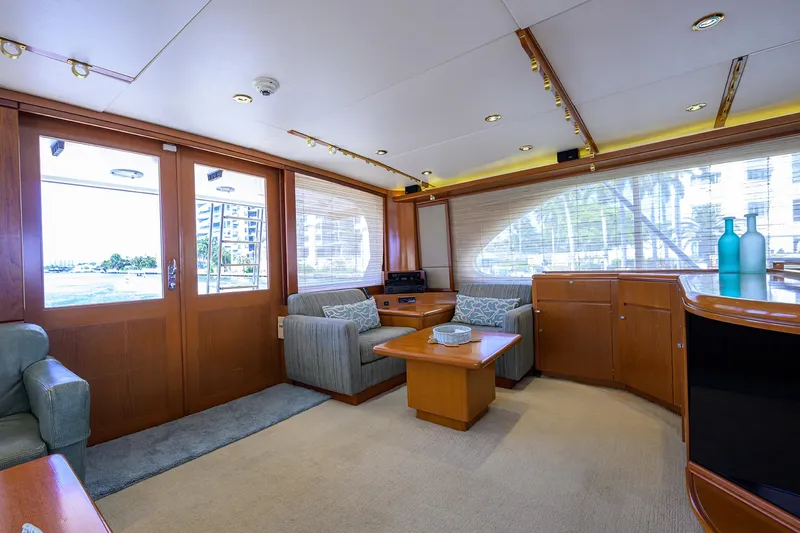 Thanks Buds Yacht Photos Pics Luxurious 1985 Feadship Yacht Fisherman interior with elegant wood finishes and comfortable seating.