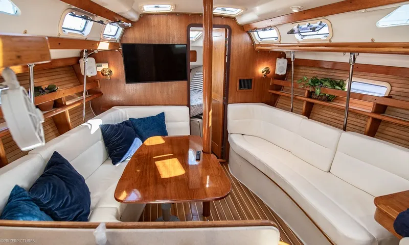 Moondust Yacht Photos Pics Interior of a 1997 Catalina 380 yacht with elegant furnishings.