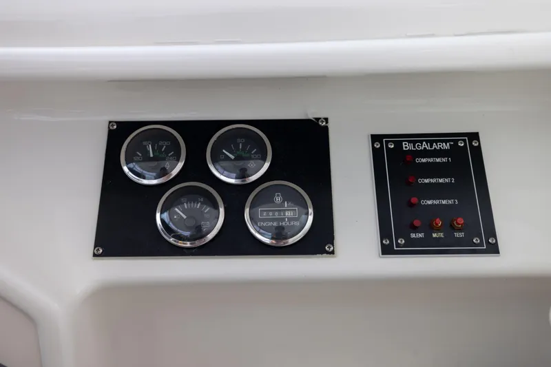  Yacht Photos Pics Control panel of a 2000 Sea Ray 370 Express Cruiser with gauges and Bilge alarm system.
