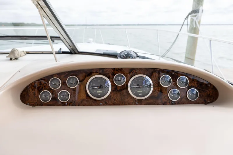  Yacht Photos Pics Dashboard of 2000 Sea Ray 370 Express Cruiser with gauges and wood finish.