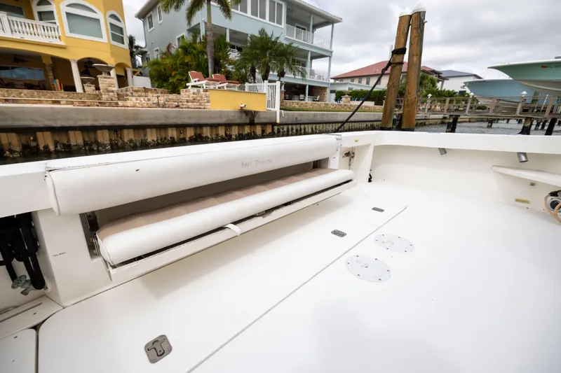  Yacht Photos Pics 2000 Sea Ray 370 Express Cruiser interior with seating, docked near waterfront homes.