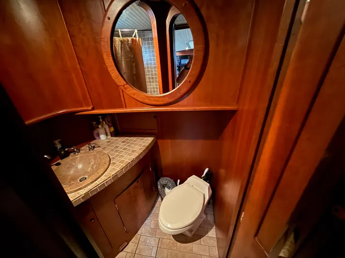 Passage Yacht Photos Pics Luxurious wooden bathroom interior on a 2009 custom Dutch canal barge.