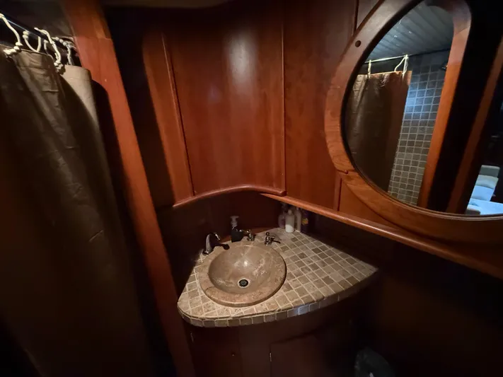 Passage Yacht Photos Pics Luxurious wooden bathroom interior on a 2009 custom Dutch canal barge.