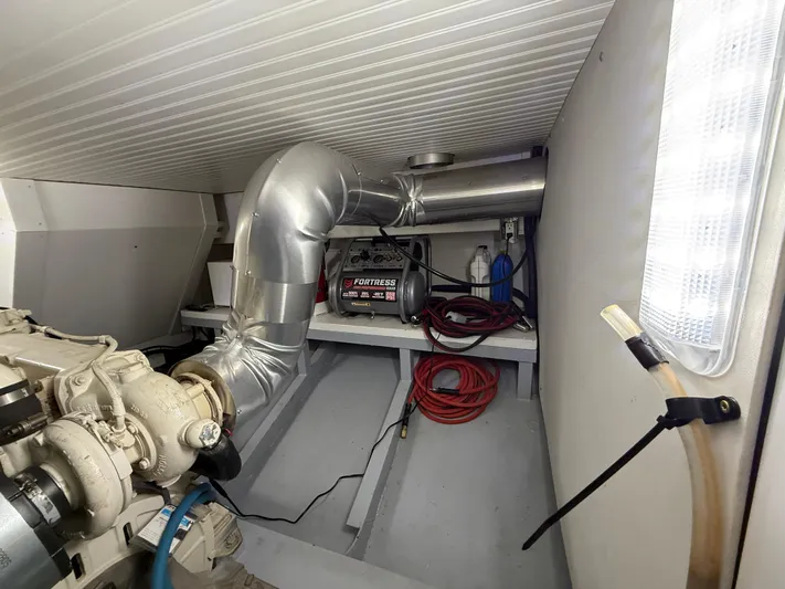 Passage Yacht Photos Pics Engine room of a 2009 Custom Dutch Canal Barge with visible machinery and equipment.