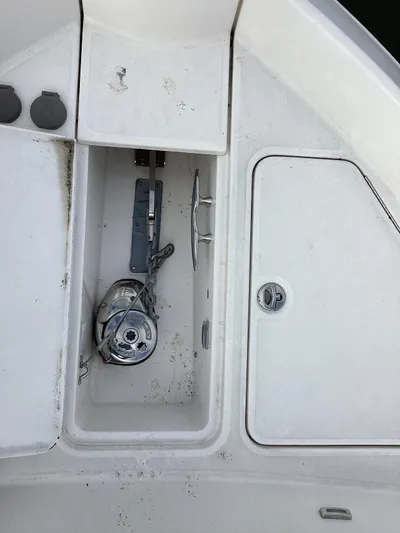  Yacht Photos Pics 2018 Regal 42 Fly boat deck with anchor storage compartment.