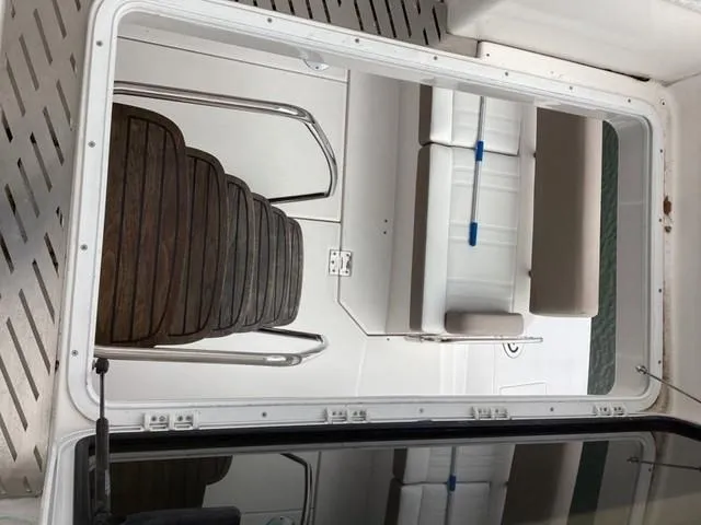  Yacht Photos Pics Interior view of 2018 Regal 42 Fly yacht with seating and table.