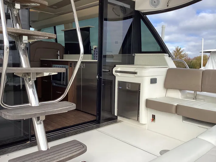  Yacht Photos Pics 2018 Regal 42 Fly yacht interior with modern seating and sleek design.