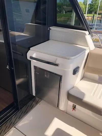  Yacht Photos Pics 2018 Regal 42 Fly yacht interior with seating and storage area.