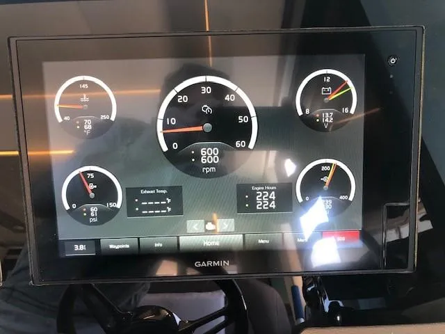  Yacht Photos Pics Garmin display on 2018 Regal 42 Fly showing engine metrics and gauges.