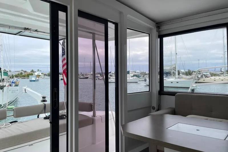 Isthmus Breeze Yacht Photos Pics Interior view of 2023 Bali 4.2 yacht with marina backdrop.