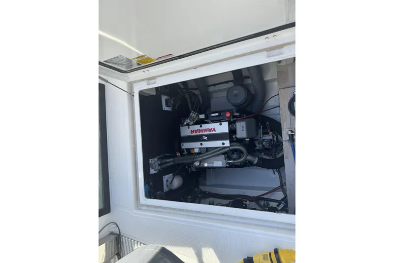 Isthmus Breeze Yacht Photos Pics Engine compartment of a 2023 Bali 4.2 boat, featuring a Yanmar engine.