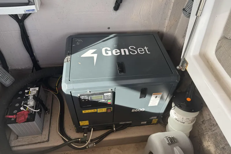 Isthmus Breeze Yacht Photos Pics GenSet 8600 generator in a Bali 4.2, 2023 model, with battery and marine filter.