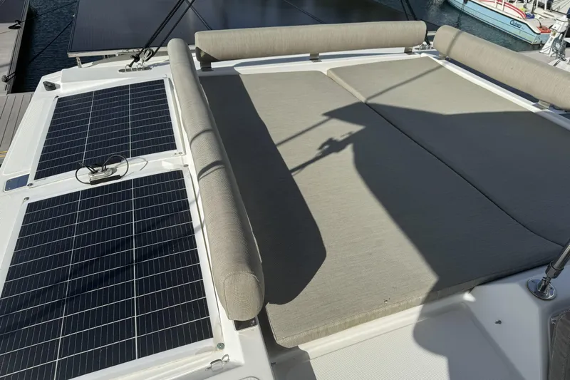 Isthmus Breeze Yacht Photos Pics 2023 Bali 4.2 yacht with solar panels and cushioned deck area.