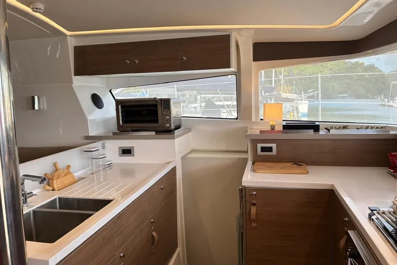 Isthmus Breeze Yacht Photos Pics Modern kitchen interior on 2023 Bali 4.2 yacht with sleek countertops and appliances.