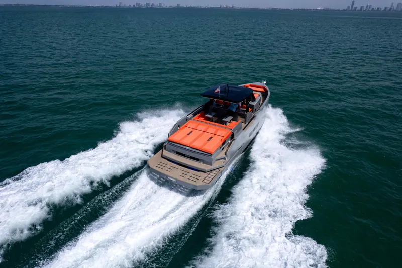  Yacht Photos Pics 2023 De Antonio Yachts D50 cruising on open water, showcasing sleek design and powerful performance.