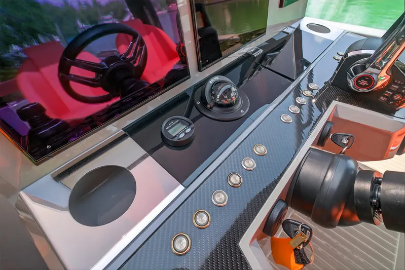  Yacht Photos Pics 2023 De Antonio Yachts D50 helm with modern controls and sleek design.