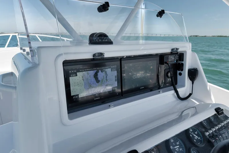  Yacht Photos Pics Control panel of a 2003 Strike 31 Open boat with navigation screens.