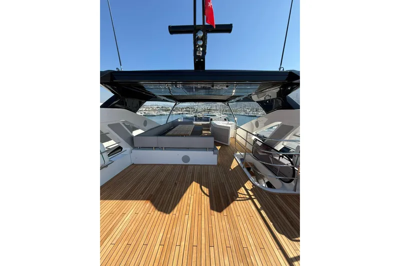Svetlana Yacht Photos Pics Luxurious 2025 Sunseeker 76 Yacht deck with sleek design and spacious seating area.