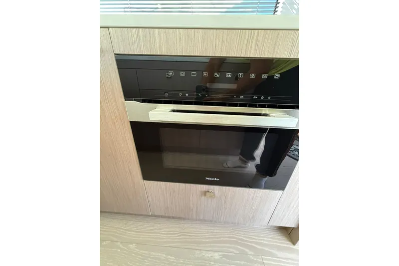 Svetlana Yacht Photos Pics Built-in Miele oven in Sunseeker 76 Yacht, 2025 model, with sleek modern design.