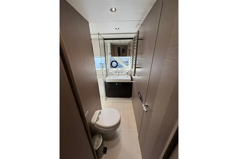 Svetlana Yacht Photos Pics Luxurious bathroom interior of 2025 Sunseeker 76 Yacht, featuring modern fixtures and elegant design.
