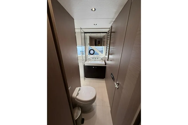 Svetlana Yacht Photos Pics Luxurious bathroom in 2025 Sunseeker 76 Yacht, featuring modern fixtures and elegant design.